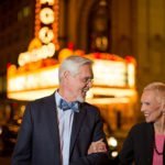 senior couple outside chicago theater