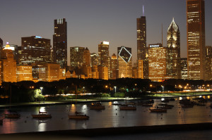 A nighttime view of the Chicago skyline from the Chicago River