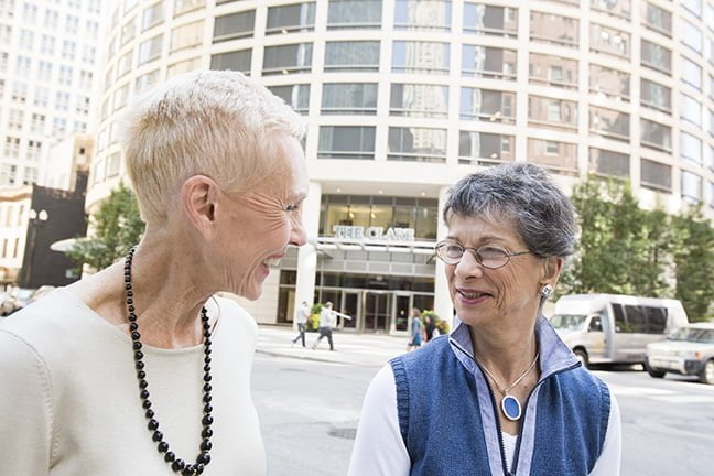 2 residents on the street in front of the clare