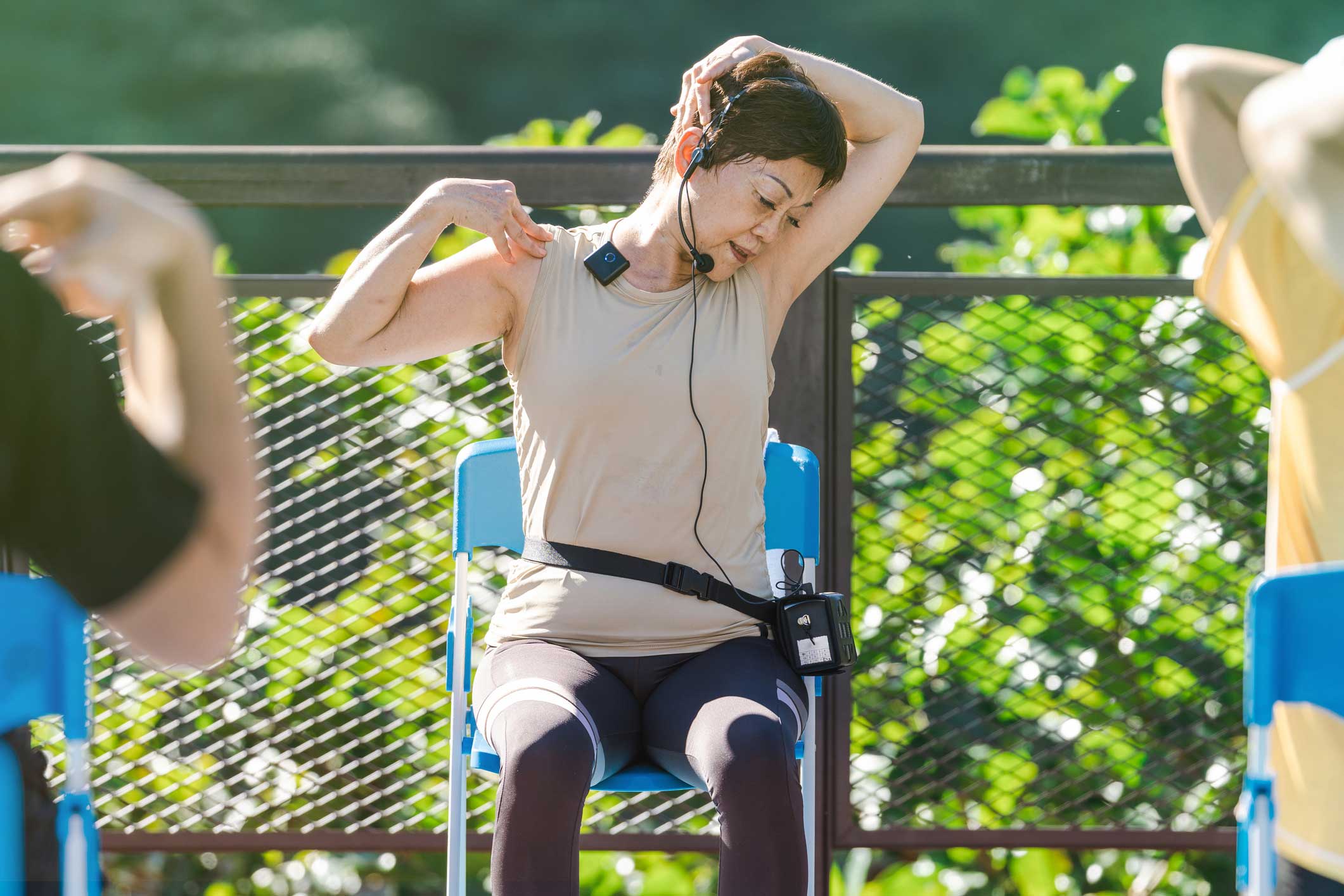 senior women participating in a Chair Pilates class