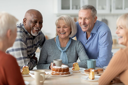 group-of-seniors-gathered-around-low-cholesterol-dessert