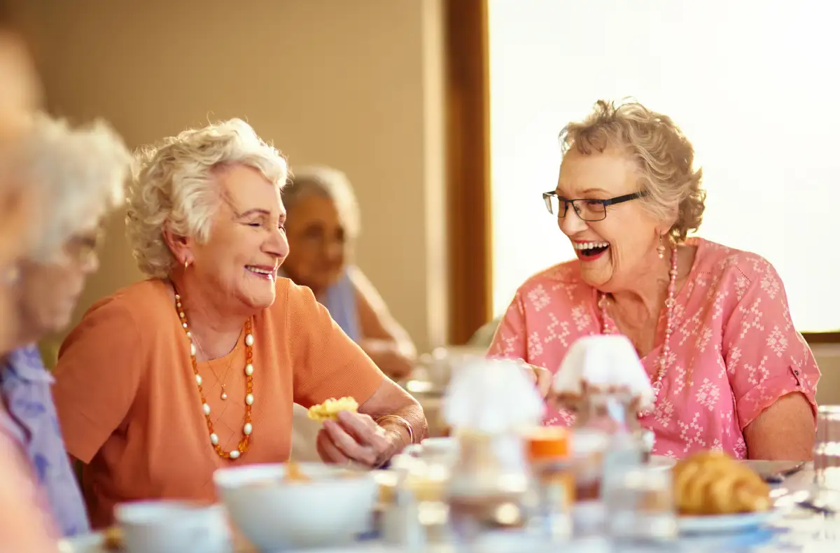a group of senior women enjoying brunch together