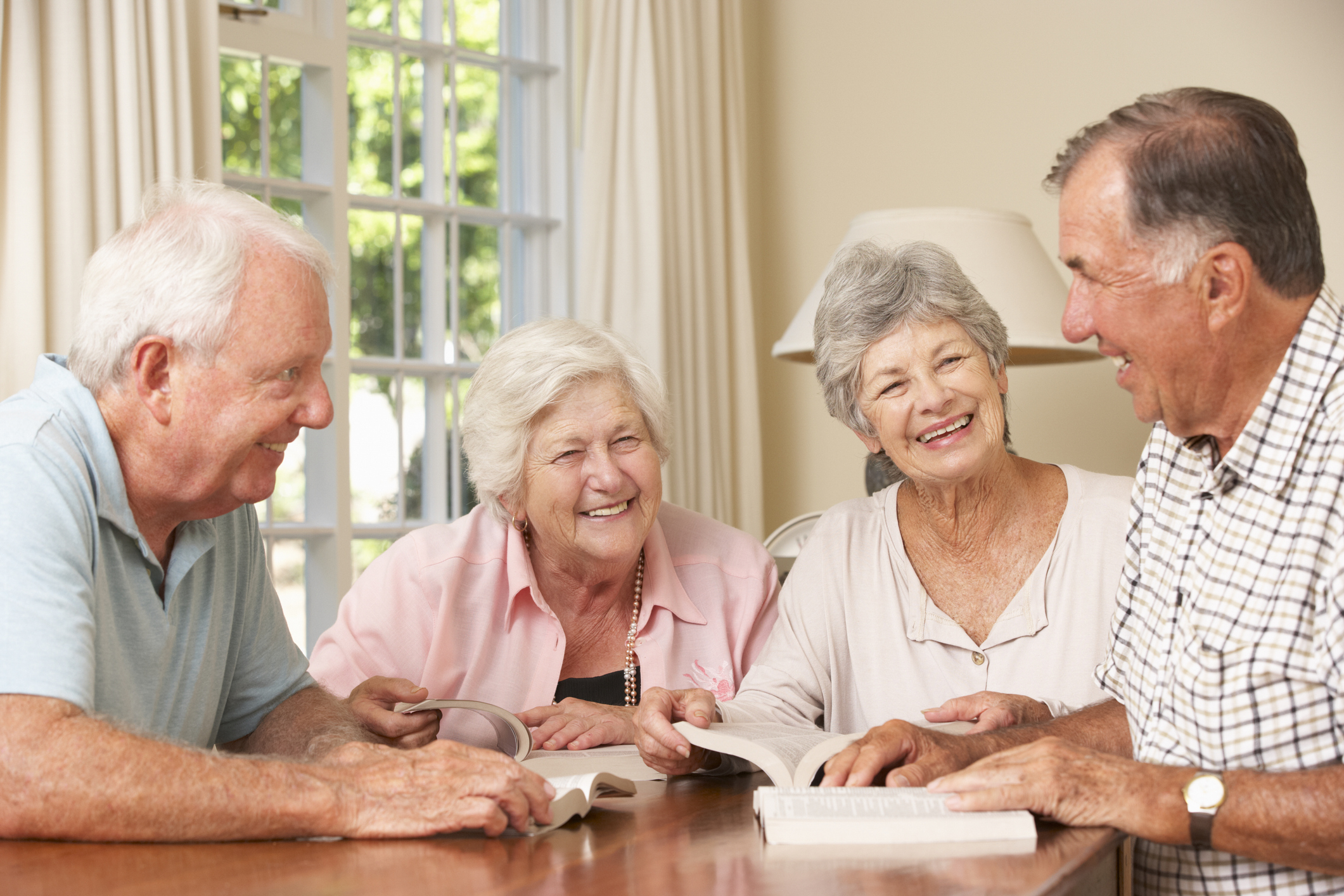 Senior couples attending book club