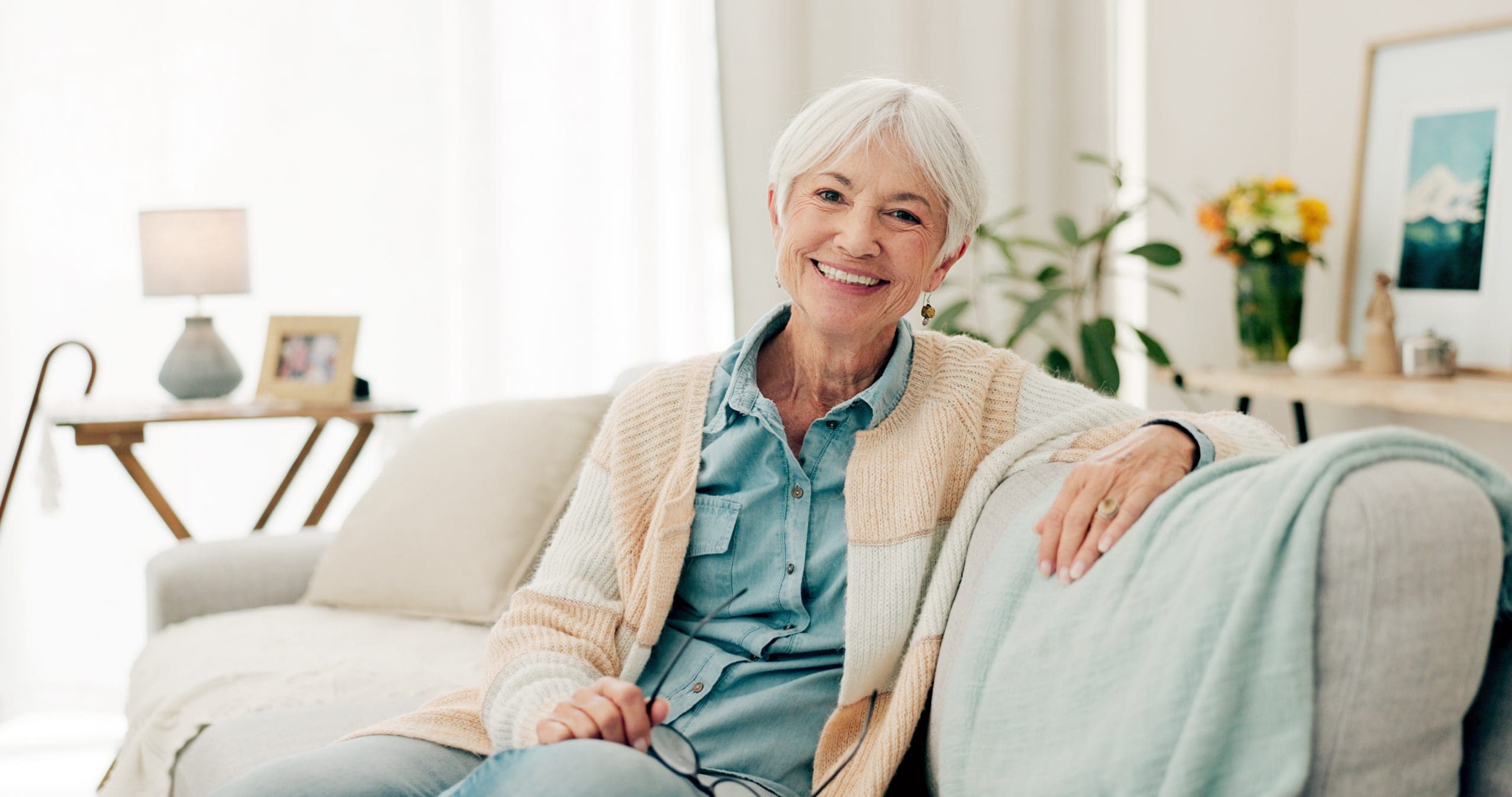 Happy, senior woman learning about entrance fees for retirement communities